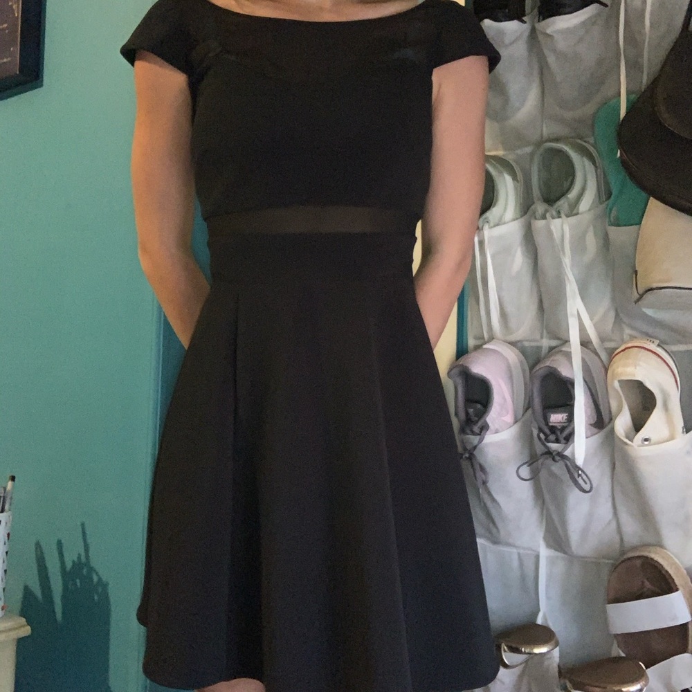 Hailey Logan simple black dress with mesh cutouts